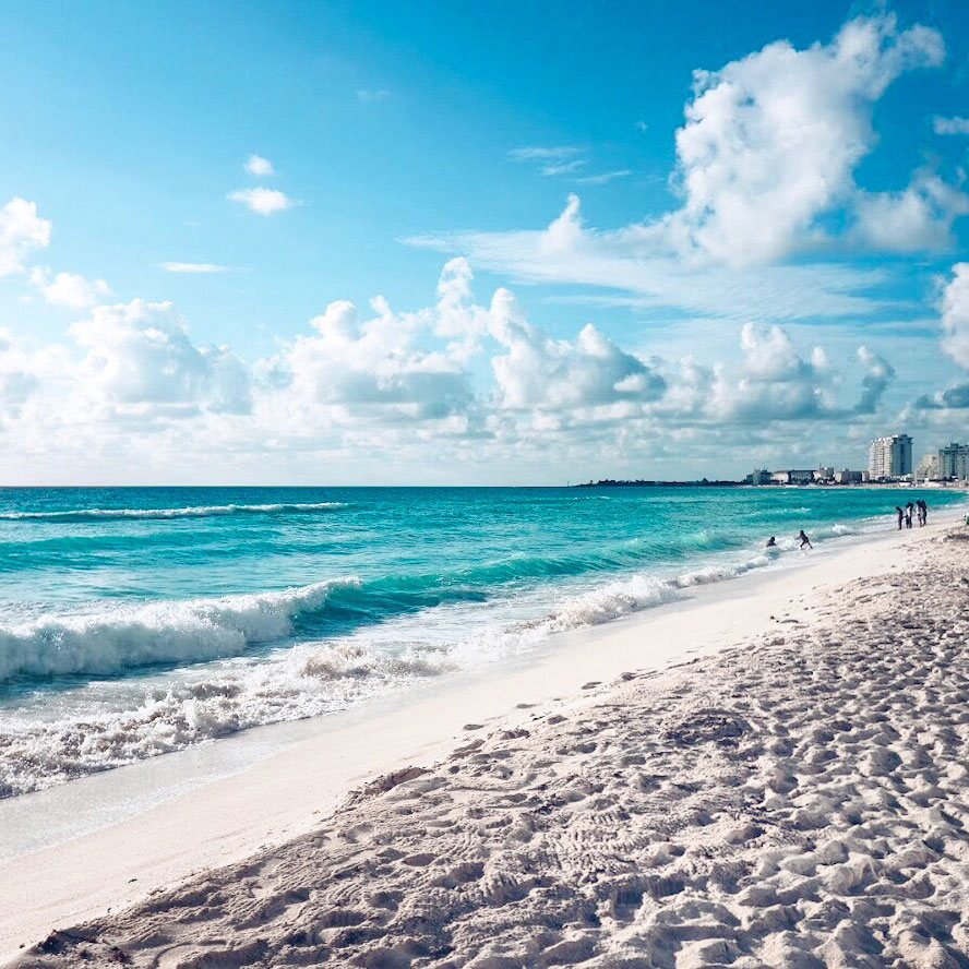 How to Purchase Insurance for Travel in the United States 1 Cancun Mexico Beach Featured image